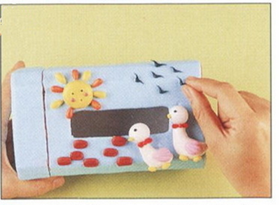 用软陶和茶叶罐DIY制作的小鸭子纸巾盒图片教程